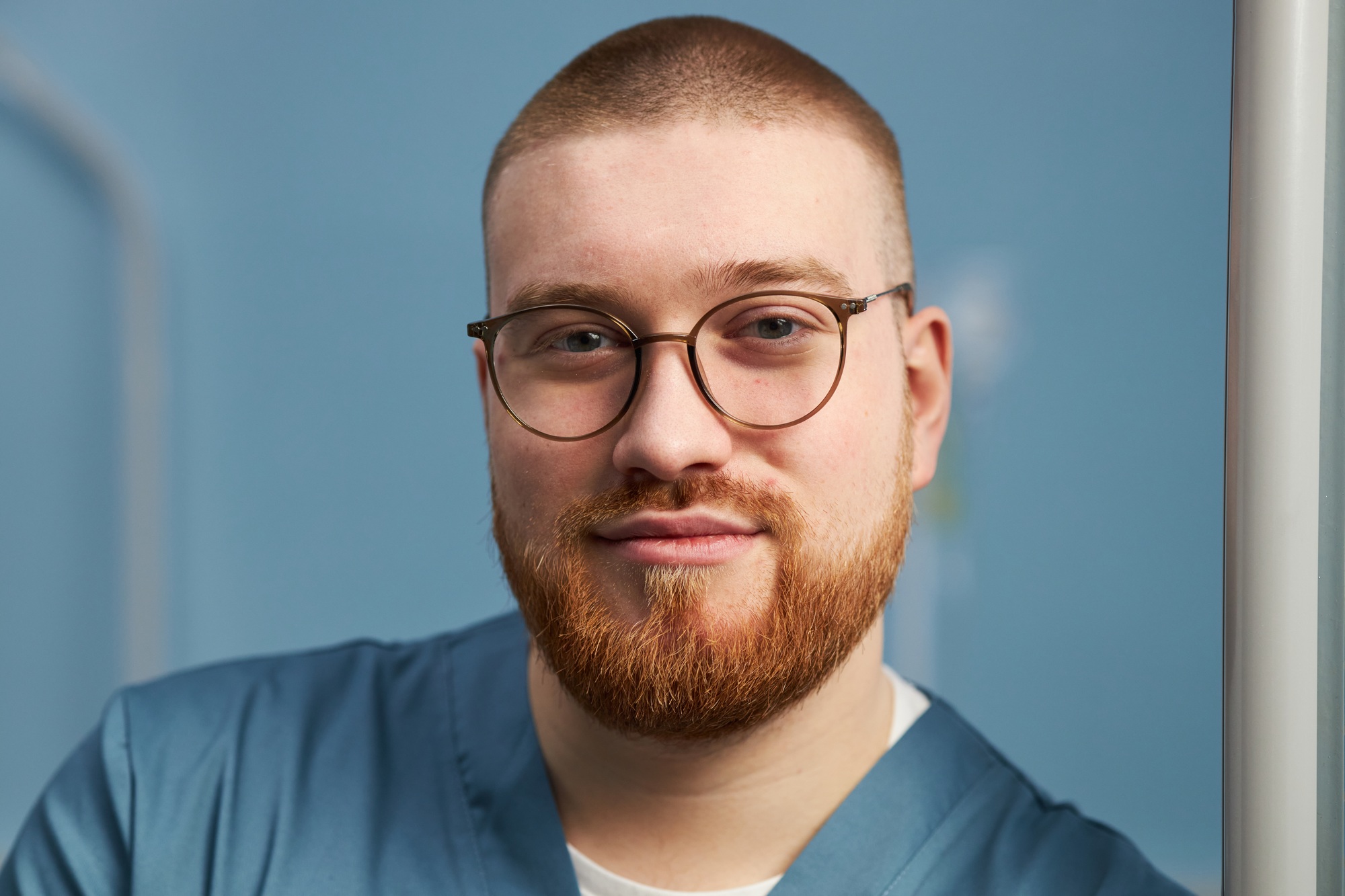 Portrait of Young Male Medical Professional Smiling Calmly